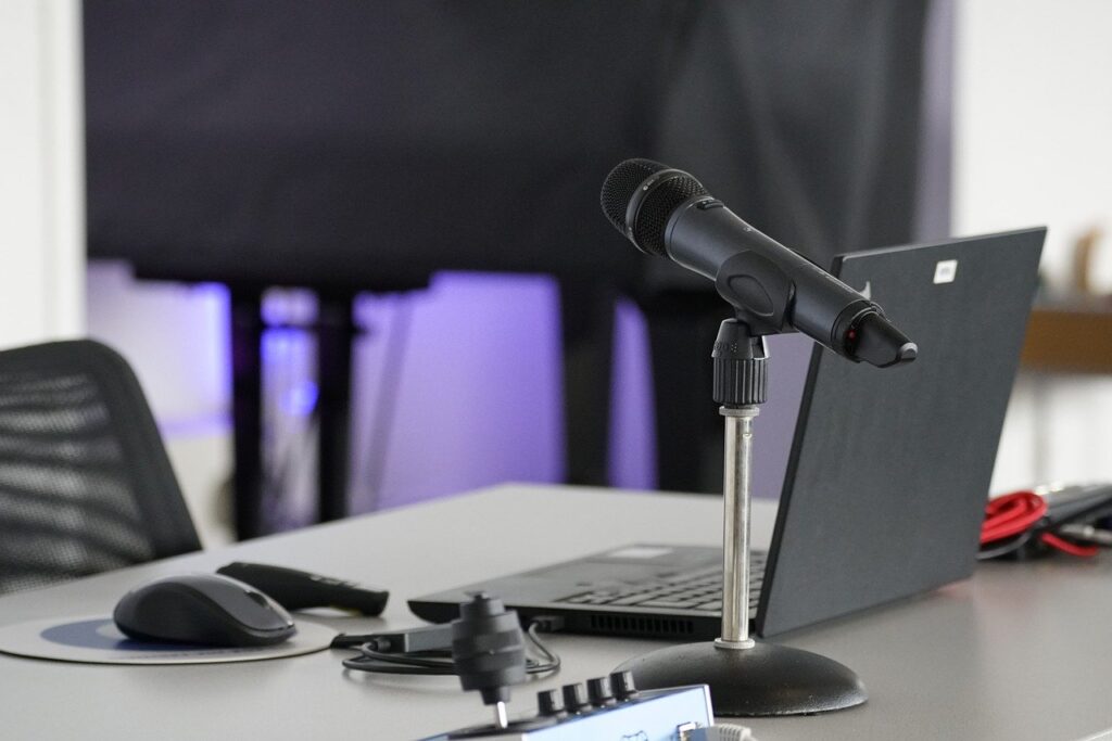 Microphone setup on a laptop desk.