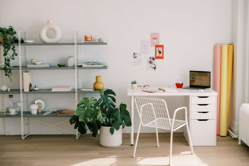 Modern minimalist home office with plants and decor