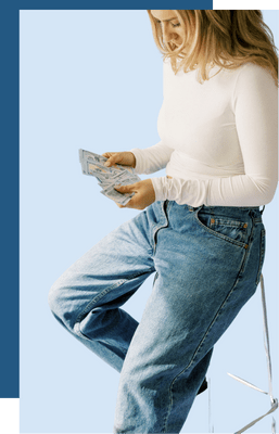 Woman counting money in casual attire