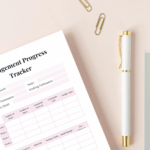 Engagement progress tracker on desk with pen and clips.