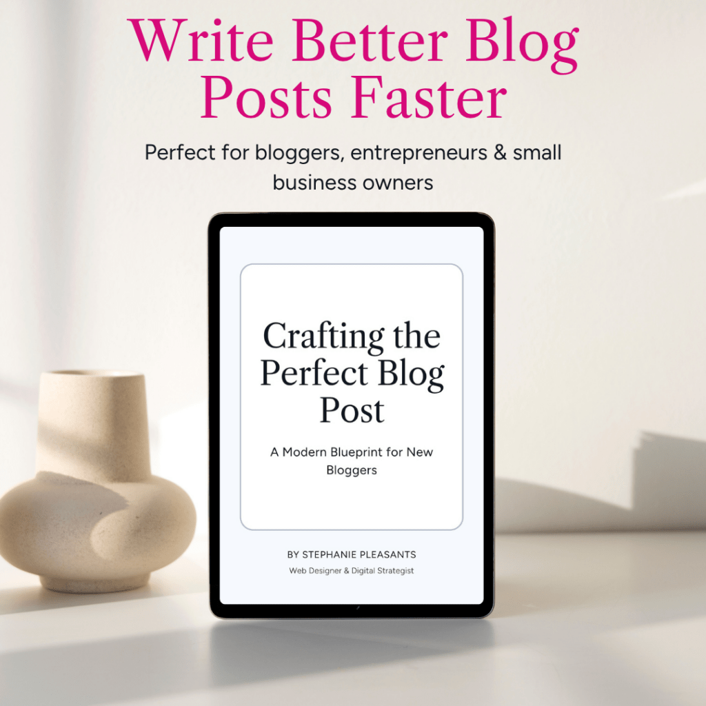 Tablet displaying blog writing guide beside ceramic vase